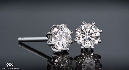 Four prong basket diamond earrings