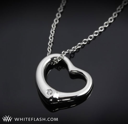 heart shaped pendant with diamonds