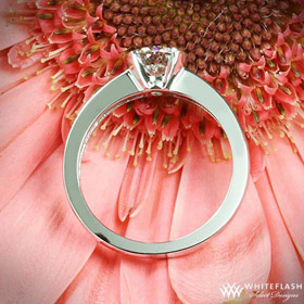 keystone solitaire engagement ring on flower