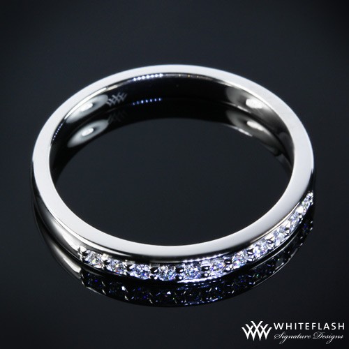 This wedding band also provides that handmade vintage look that is so hot 