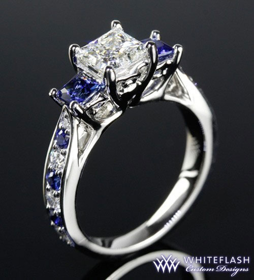 princess cut diamond with sapphire three stone ring