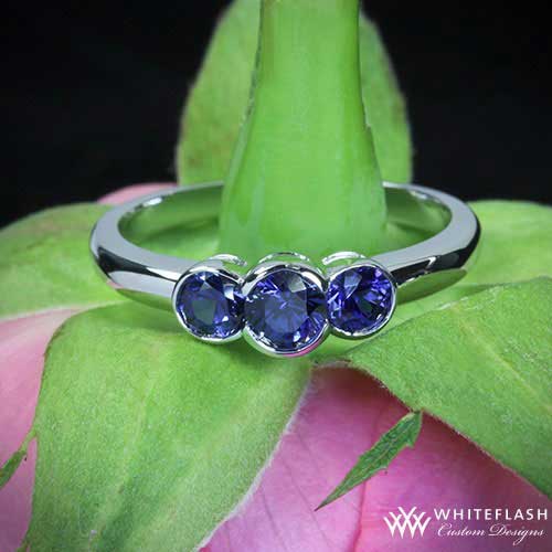 blue sapphire three stone ring