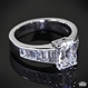Custom Emerald and Baguette Diamond Engagement Ring