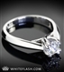 Hand Over Hand Solitaire Engagment Ring