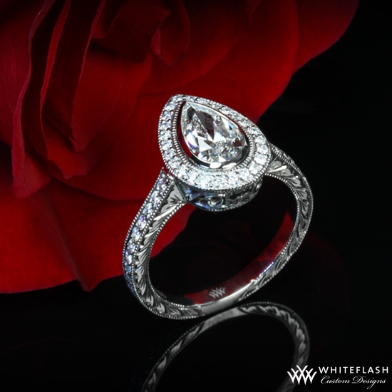 elegant pear halo engagement ring