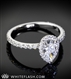 Shared Prong Pear Halo Engagement Ring