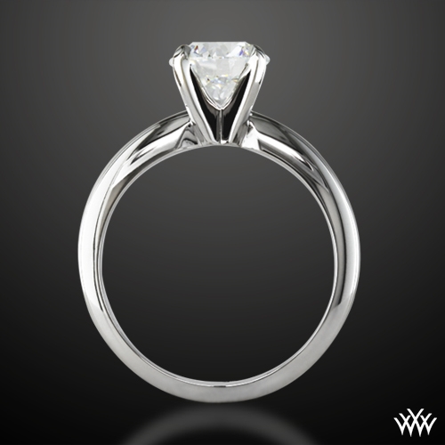 Solitaire Engagement Ring Embellished With a Four Prong Signature Head