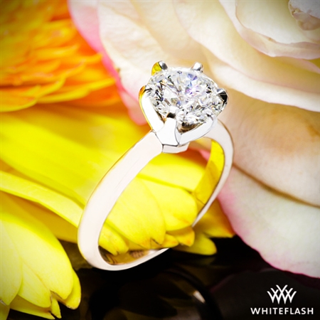 The diamond in the setting look absolutely beautiful!