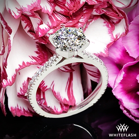 The center diamond looks amazing and the craftsmanship of the ring is also fantastic