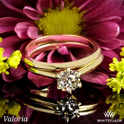 The diamond is beautiful and sparkles magnificently...and I love it.