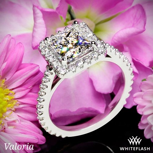 Solitaire Engagement Ring Embellished With a Four Prong Signature Head