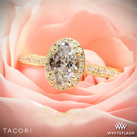 The oval diamond is radiant, the intricate and timeless design just brought her to tears. 