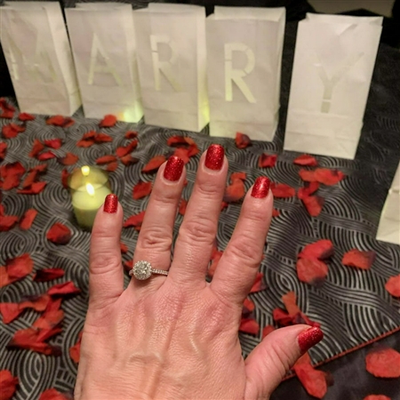 She looks at it every five minutes and says: "I love my ring".