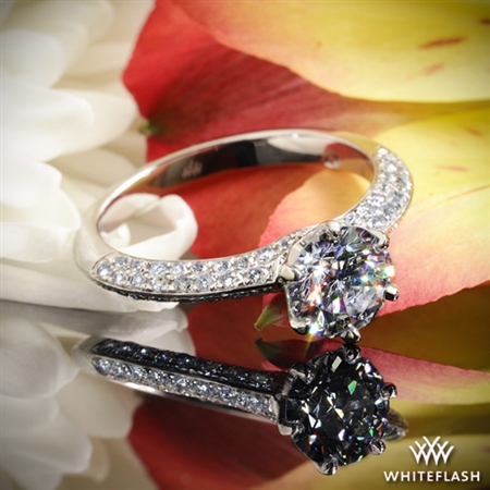The ring looks gorgeous and the diamond is definitely performing well under the light! 