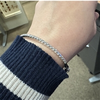 Shared-Prong Diamond Bangle