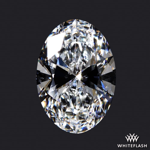 Oval-shaped diamond with a noticeable dark bowtie effect across the center, showing a clear contrast between the brighter ends and the darker midsection.