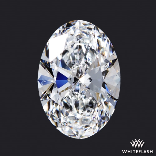 Oval-shaped diamond with a less pronounced bowtie effect, showing a more evenly distributed brightness across the stone's surface, with slightly darker areas in the midsection.