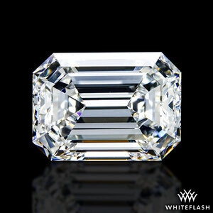 Close-up image of an emerald-cut diamond with high clarity and precision, reflecting light in a step-cut pattern typical of emerald cuts.