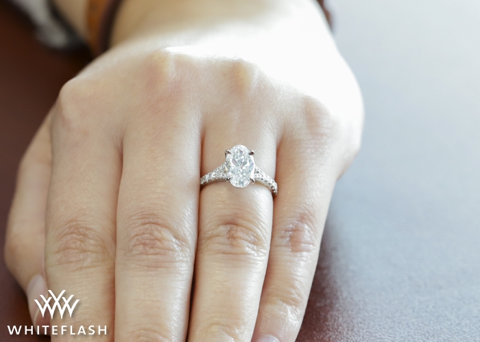 A Jaffe Oval Engagement Ring on a Finger