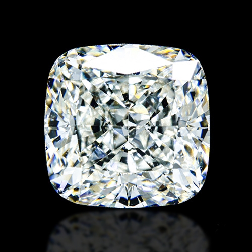 Crushed ice cushion cut diamond with a dazzling, chaotic sparkle and a unique, brilliant texture