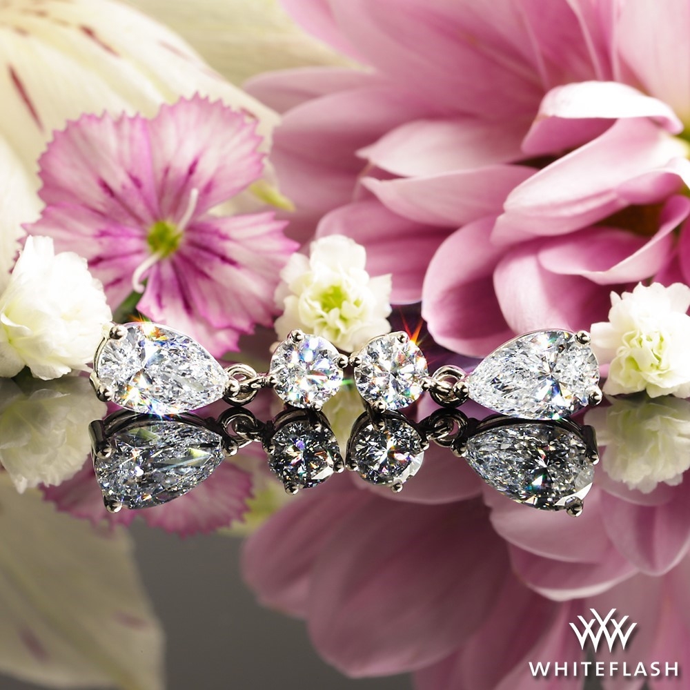 Round And Pear Tandem Diamond Earrings