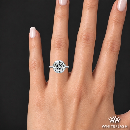 4 ct (10.4mm) with a size 6 finger